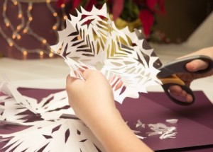 cutting snowflakes